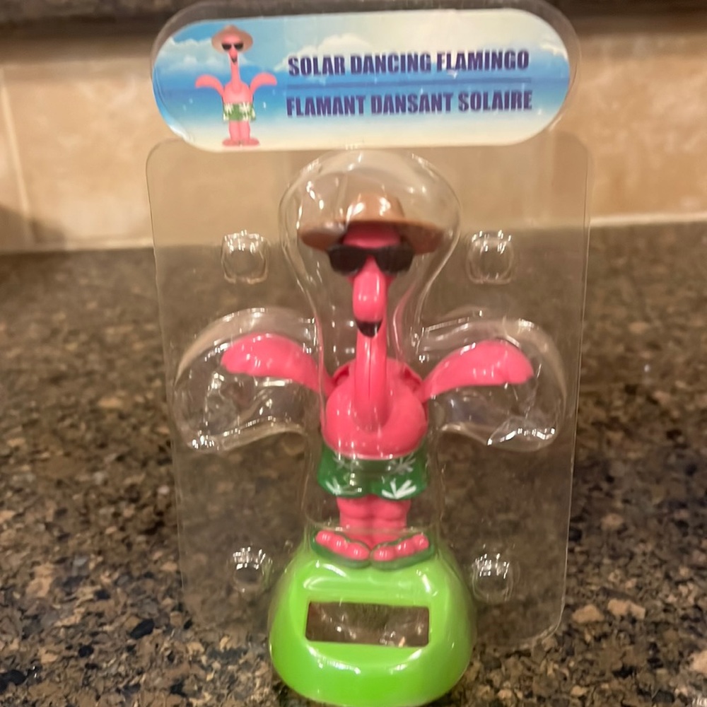 Solar power flamingo dancer